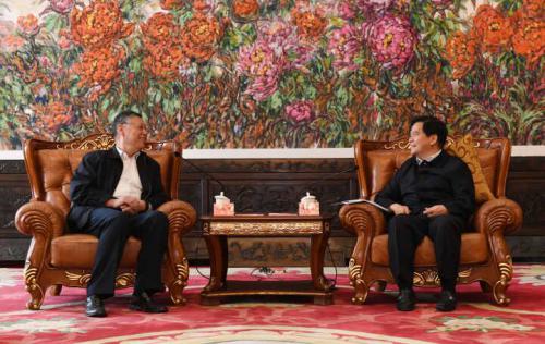 李纪恒拜会全国政协副主席刘新成